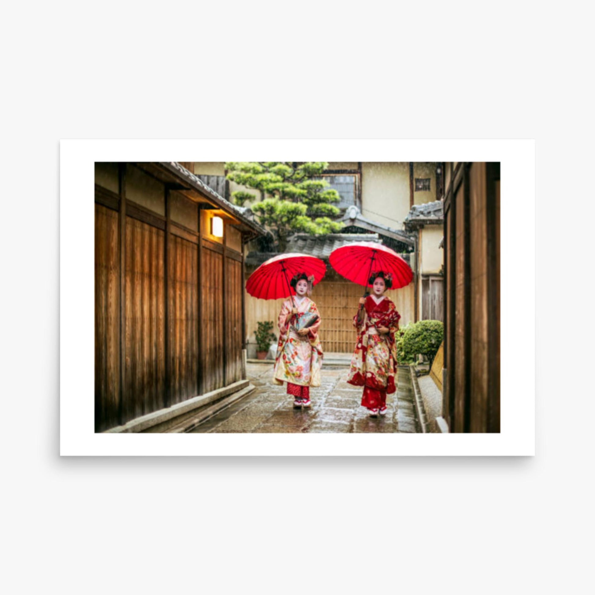 Geishas holding red umbrellas during rainy season 24x36 in Poster