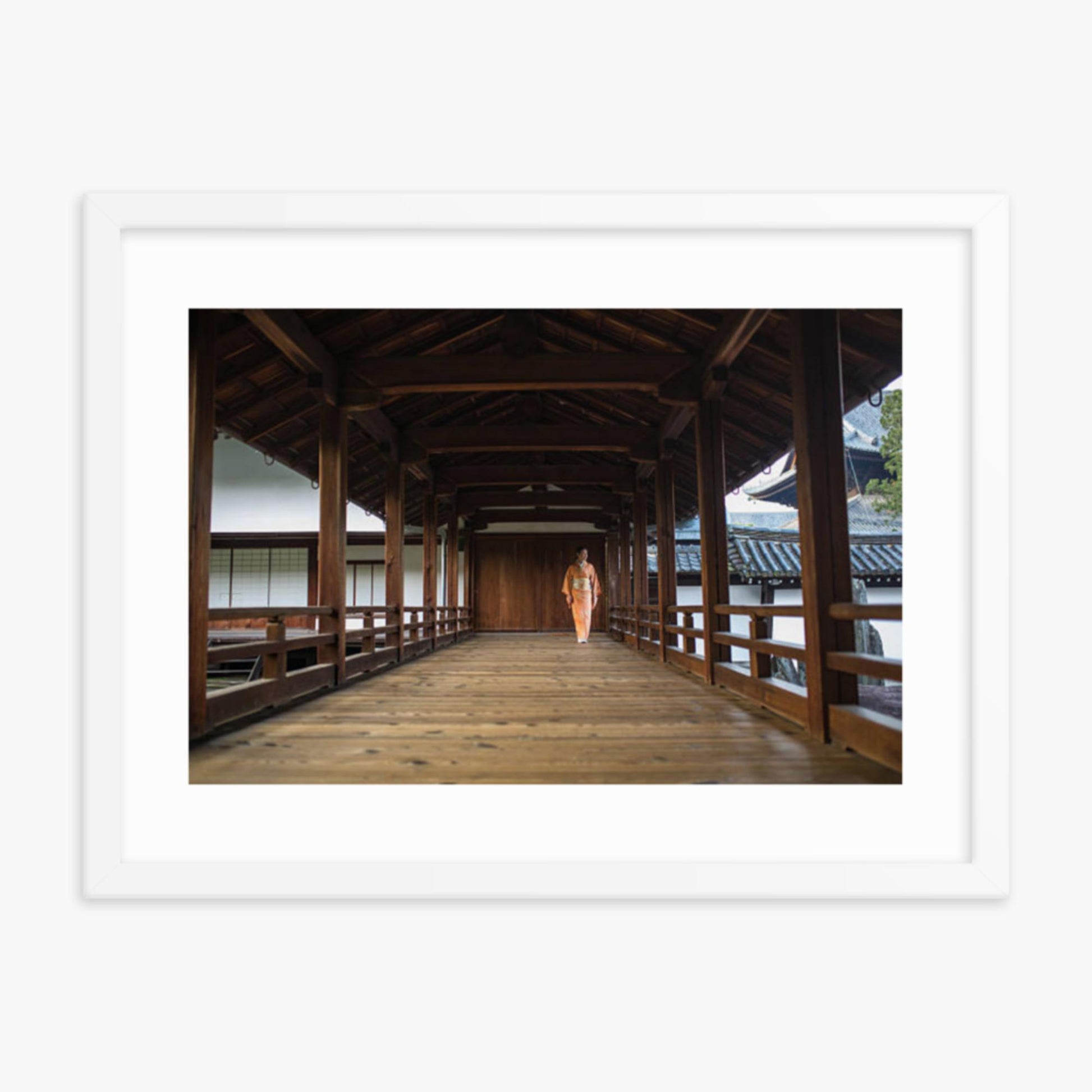 Woman in a kimono walking through a temple corridor 18x24 in Poster With White Frame